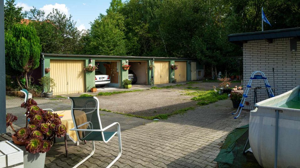 Immobilienmakler Bochum Gerdt Menne Haus kaufen Bochum Mehrfamilienhaus in Bochum Riemke hier Gartenansicht