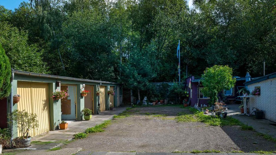 Immobilienmakler Bochum Gerdt Menne Haus kaufen Bochum Mehrfamilienhaus in Bochum Riemke hier Gartenansicht