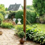 Immobilienmakler Bochum Gerdt Menne Haus kaufen Bochum klassisches Zechenhaus in Bochum Hordel hier Gartenansicht